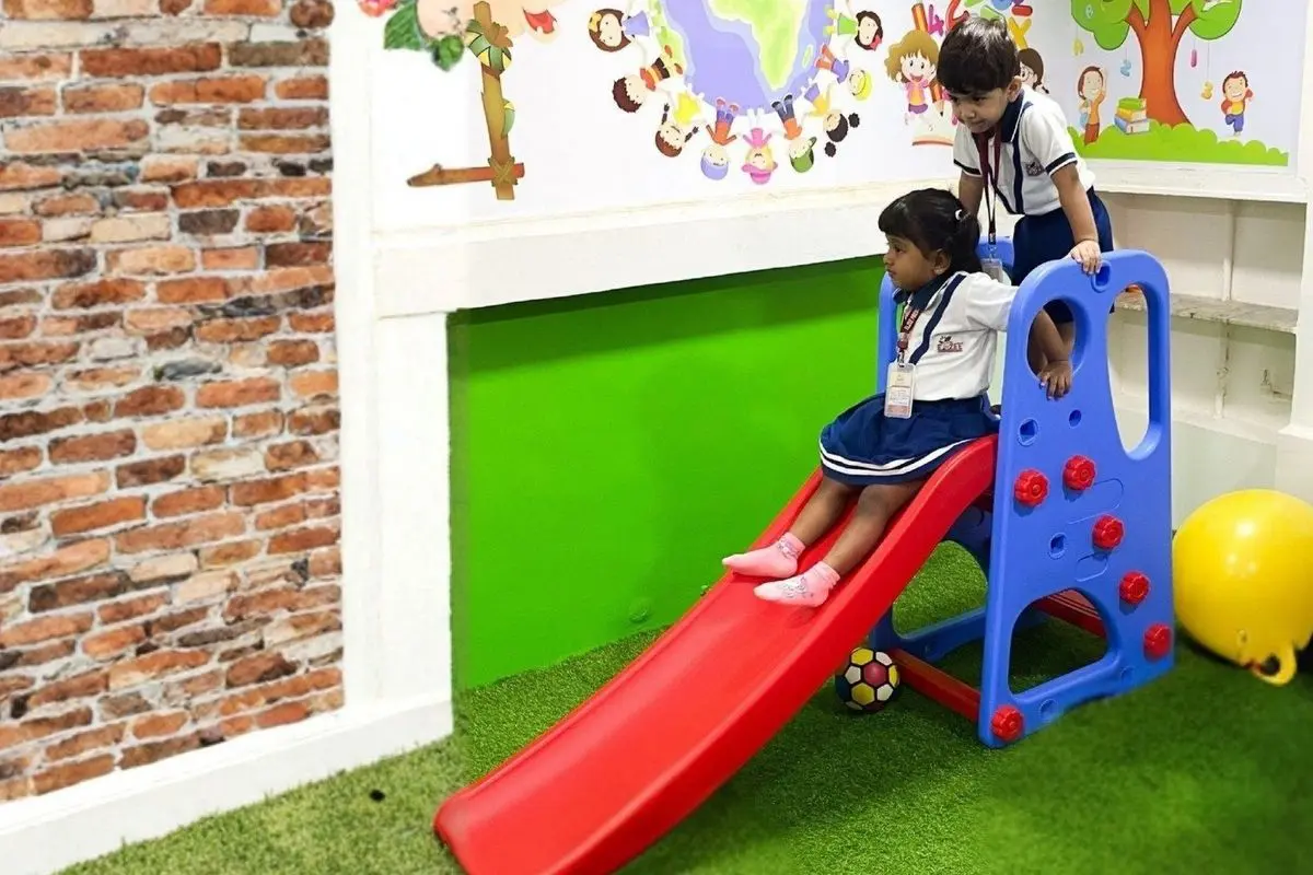 Toddlers at Elzee Preschool playing together and learning social skills through group activities